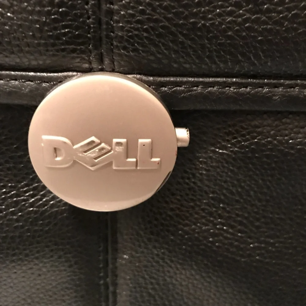Dell laptop and office briefcase 💼